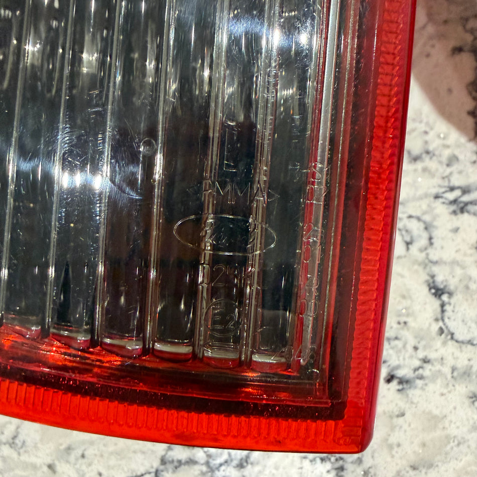 ST150 pre-facelift rear lens, never been on car still in original packaging.